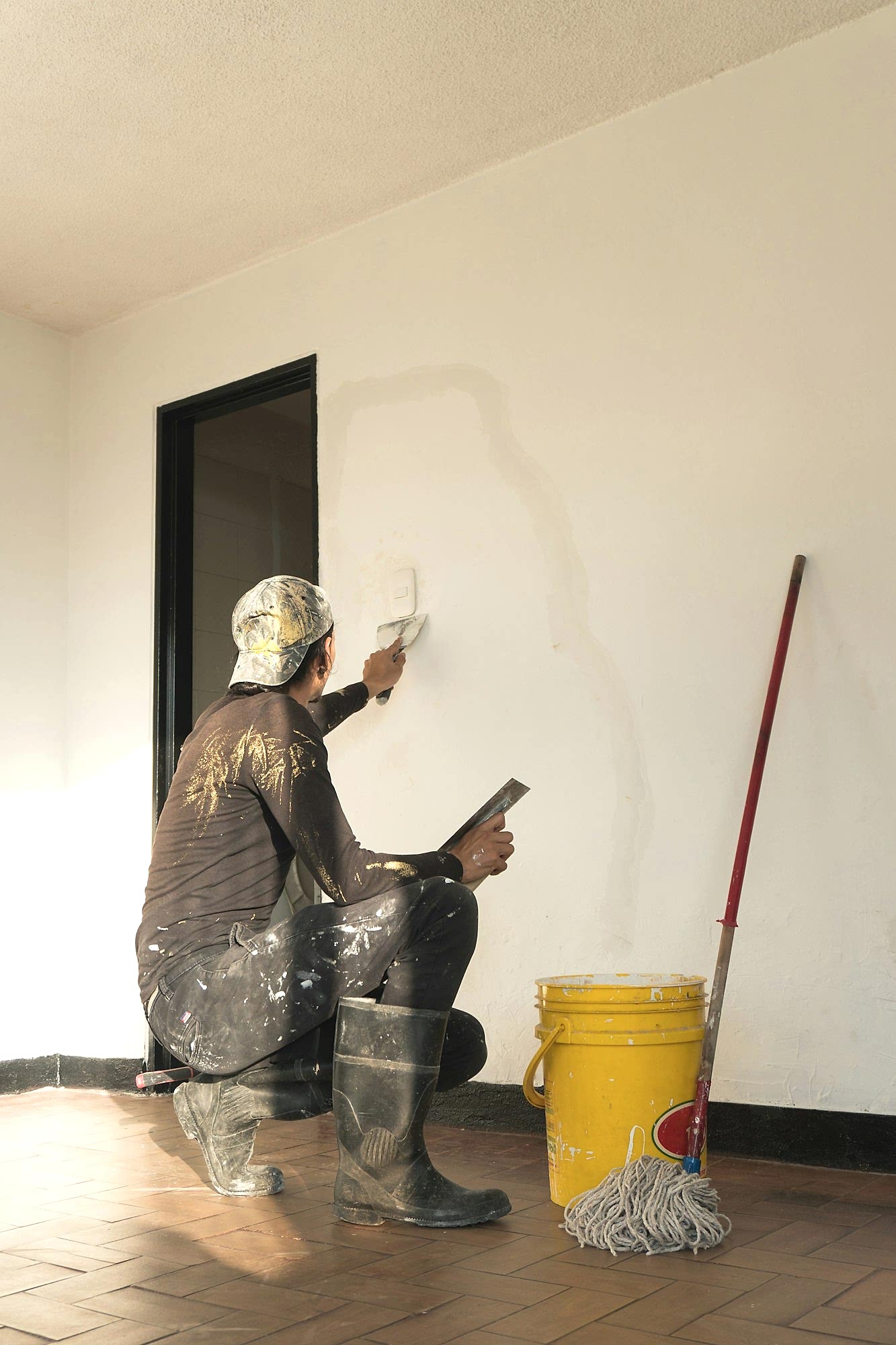 man making repairs in his house. home renovation.